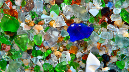 colorful glass pebbles on the beach, closeup of photoの写真素材