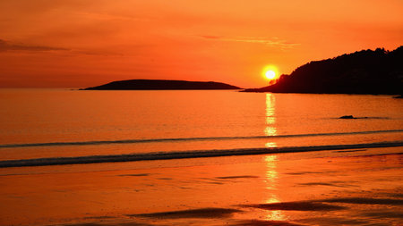 Reddish-orange sunset in Panxon, on the Camino de Santiago.の写真素材