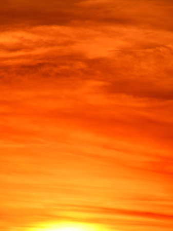 Beautiful orange sunset in the sky. Sky background. Nature wallpaper.の写真素材