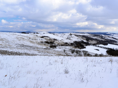 Snowy winter landscape in the Mures County, Transylvania.の写真素材