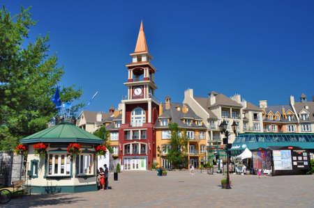 Mont-Tremblant, Canada - July 16, 2013: Center of the Mont-Tremblant Ski Resort in summer with cable car station on the right side.のeditorial素材