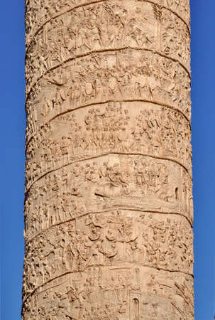 Rome, Italy - July 28, 2014: Detail of the relief at Trajan's Column at Trajan's Forum in Rome. The marble column was constructed in AD 113, commemorating Roman emperor Trajan's victory in the Dacian Wars.のeditorial素材