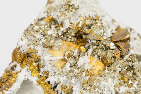 The Chalcopyrite (CuFeS2) contains Copper, Iron and Sulfur here in combination with Quartzの写真素材