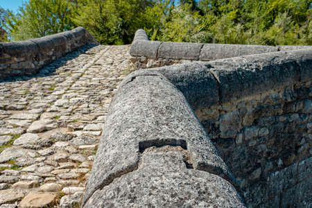 Pont sur la Laye or Pont roman de Mane is an old stone arch bridge across the stream Laye in the French Provence close to the town Mane.の写真素材