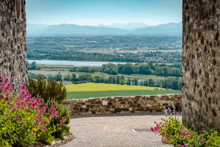 Wide view over Rhoney valley from Rochemaure Castle, France on a sunny summer dayの写真素材