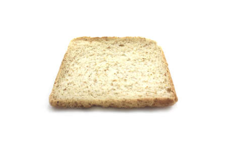 A slice of whole wheat bread against a white background