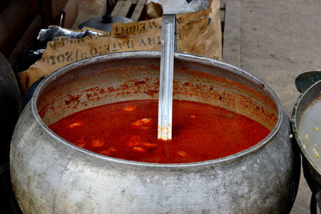 soup in cast-iron cauldron. Ukrainian national cuisine. ethnographic festival. Ukraineの写真素材