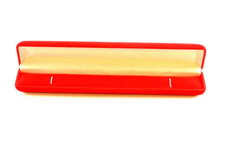 Isolated image. an open a small oblong box for exquisite jewelry velvet of red velvetの写真素材