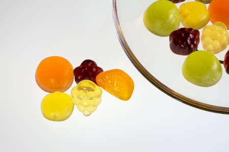 Fruit gummi candies assortment on whiteの写真素材