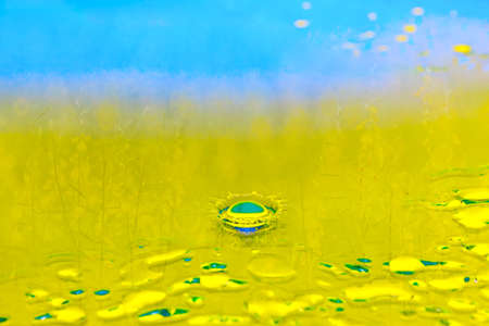 Beautiful splash of water drop. Freeze action. High-speed shooting of water drop. Beautiful drops of stop time, water splashing close up. Crystal clear water waves, drops and sprays. Crownの写真素材