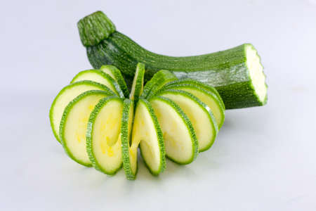 Fresh cutted zucchini isolated on a white background.の写真素材