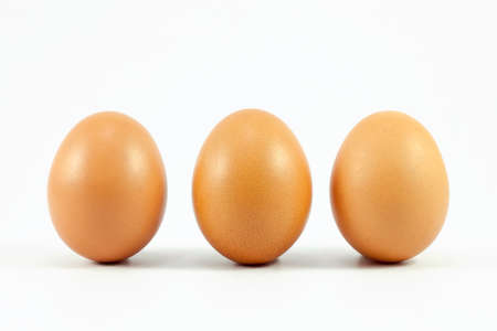 three eggs isolated on white backgroundの写真素材