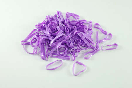 purple plastic band on white background