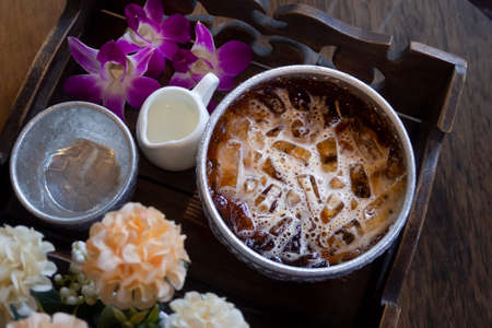 cold espresso coffee with milk drink on plate.の写真素材