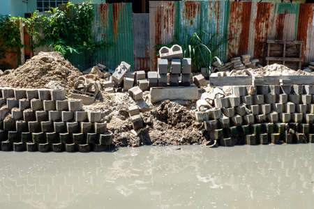 Brick wall for containing a water channel