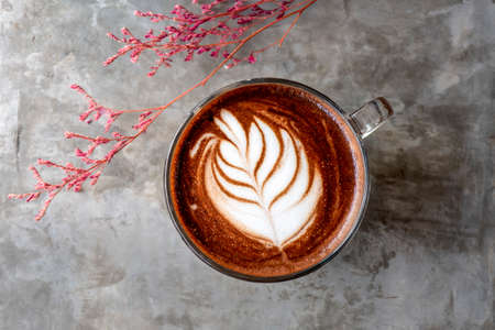White cup of tasty mocha with art latte.