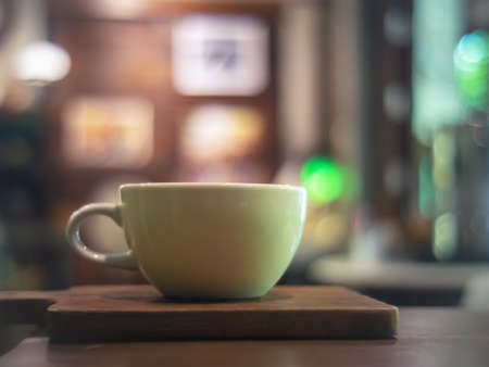 White cup of tasty cappuccino with art latte.の写真素材