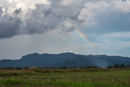 Rainbow on Mountains in Thailandの写真素材