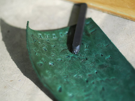 Leather and craft tools on table,の写真素材