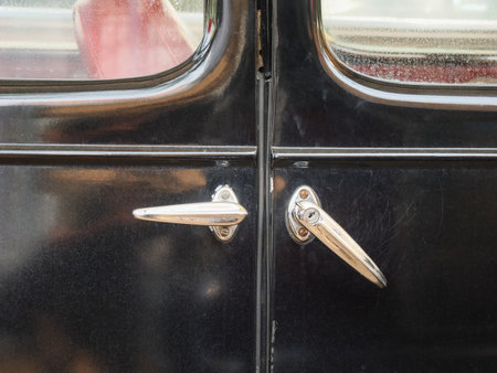 A door handle of a retro car