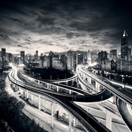 Shanghai City at sunset with light trailsの写真素材