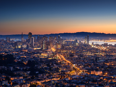San Francisco skyline and Bay Bridge at sunset, Californiaのeditorial素材