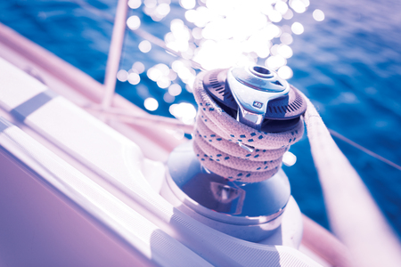 Sailboat winch and rope yacht detail. Yachtingの写真素材