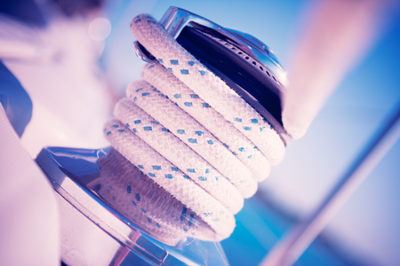 Sailboat winch and rope yacht detail. Yachtingの写真素材