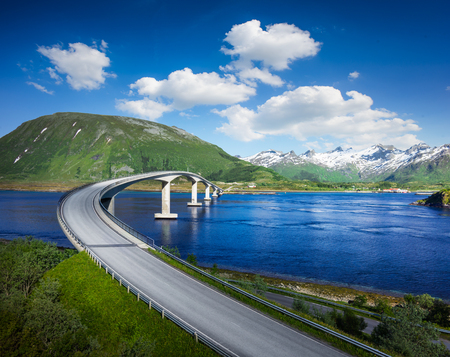Norway famous bridge with mountains in background. Beautiful road over river in nature.の写真素材