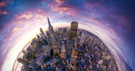 San Francisco aerial view from sea side. Port of San Francisco in the front. City downtown and skyscrapers at sunrise.の写真素材