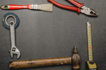 old tools set on dark background. Father's day concept with empty space for copy, text, lettering.の写真素材
