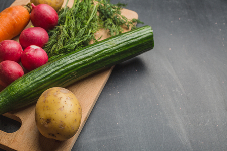 fresh raw vegetables on a black backgroundの写真素材