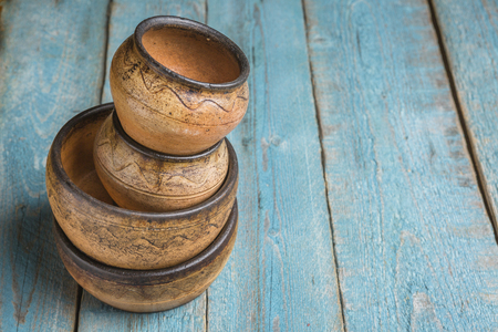 Empty bowl on rustic woodの写真素材