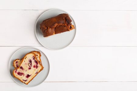 Homemade berry cake on white wooden background top view with copy spase
