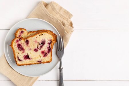Homemade berry cake on white wooden background top view with copy spase