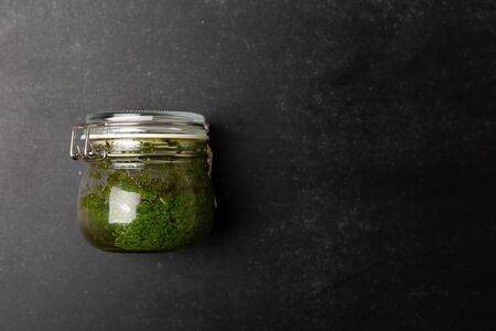 Homemade pesto sauce fresh basil, pine nuts and garlicの写真素材