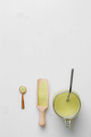Matcha latte with coconut milk in jar glassの写真素材