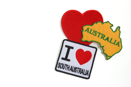 Handmade embroidery art of â€œI LOVE South Australiaâ€ with red heart and map on white...