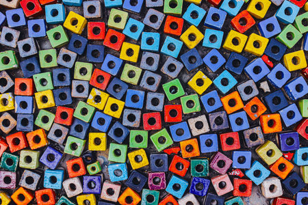 Colorful mosaic wall texture background , multicolor square bead pavement on walkway, artistic mosaic texture reflecting urban diversity and creative background.の写真素材