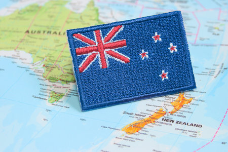 Natural fiber New Zealand flag embroidery on map at Wellington. Concept for travel, national pride, Earth Day and sustainable lifestyleの写真素材