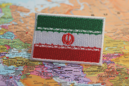 Iran flag on the map Iranian flag on a world map pinpointing Iranâs location. Eco-conscious textile design conveys patriotism, sustainable travel, and global connection.の写真素材