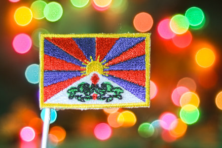 Eye-catching flag with a sewn finish, on a background of luminous, multi-colored bokeh lights. Ideal for Asian travel, cultural identity, and festive visuals.の写真素材