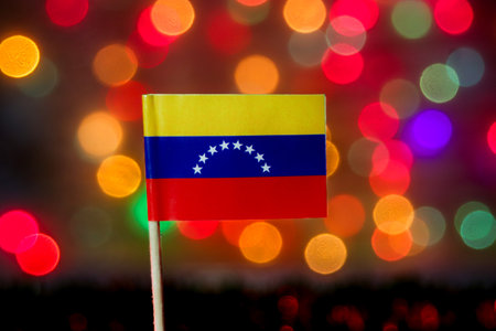Venezuelan flag on a dreamy bokeh background symbolizing independence, hope, and national pride. Ideal for travel and editorial design use.の写真素材