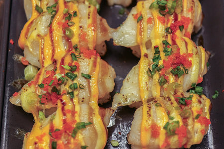 Close-up shot of Pork Belly Sushi rolls. Fusion food reflecting gourmet barbecue and Japanese style. Cuisine appetizer.の写真素材