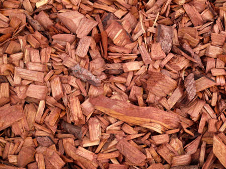 Decorative natural red wood chips, background