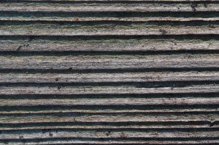 The texture of the old dark board, background, macro.