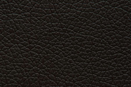 Dark brown artificial leather with large texture, background, macroの写真素材