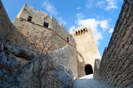 The main attraction of Lindos is the ancient Acropolis, Rhodes, Greece.の写真素材