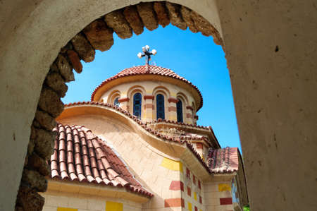 View through the arch of the Church of St. Nectarios, Rhodes, Greece.の写真素材