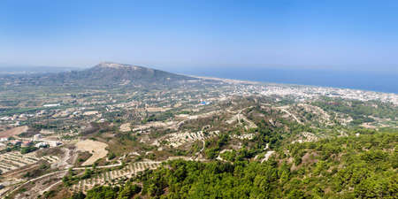 View of the coast of Rhodes island and the Aegean sea from Filerimos mountain.の写真素材